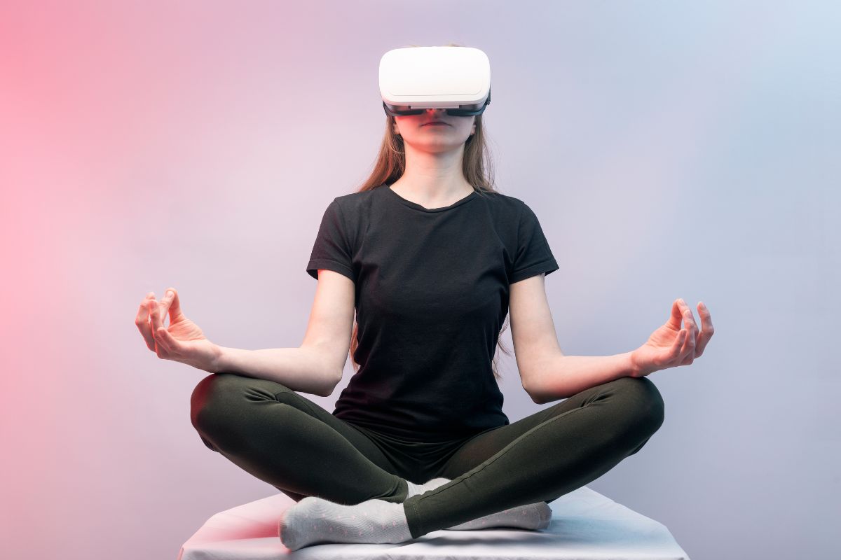 Girl experiencing virtual reality, woman in vr glasses meditates.