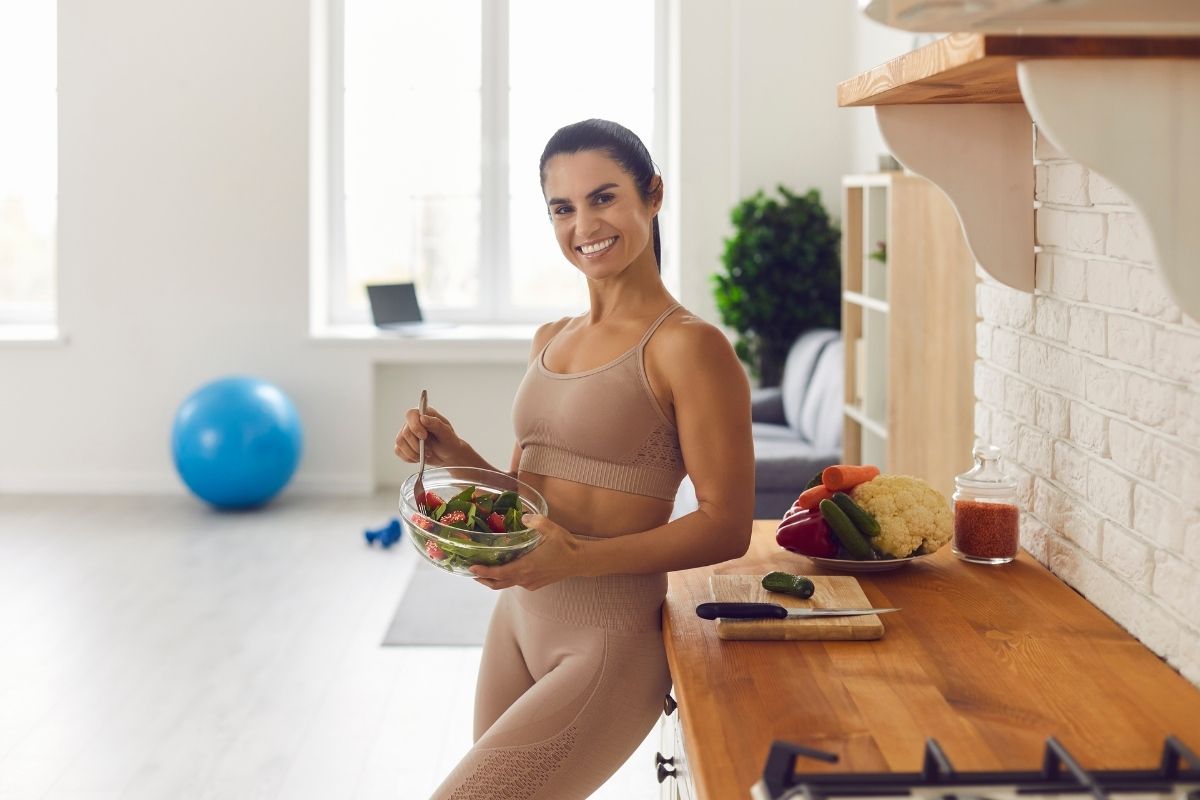 Positive lady enjoying vegetarian diet and healthy food.